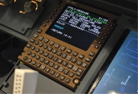 A multifunction control display unit in aircraft cockpit shows a controller-pilot datalink communications (CPDLC) message. (Photo: FAA)